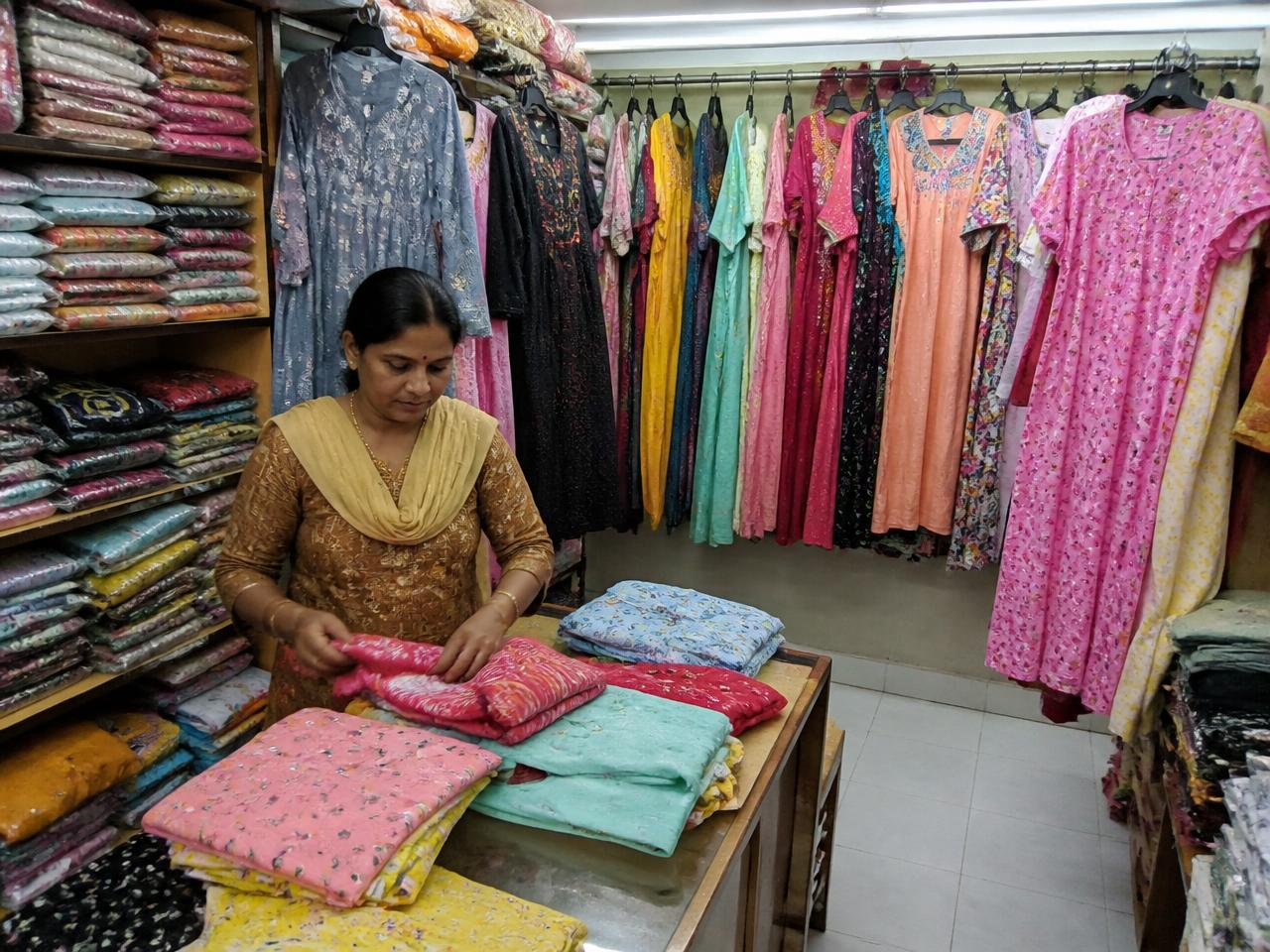 Inside AR Collections textile shop at Karumbukadai, Coimbatore with racks of nighties and kurtis